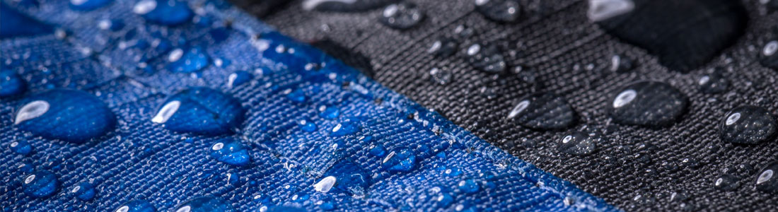 blue and black fabric with water droplets