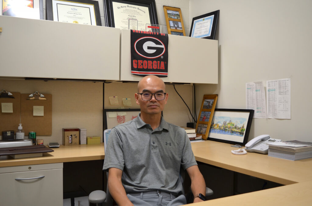 Wang Web Portrait XQ Wang in his office, where he works on his research with the New Materials Institute. Wang recently completed the UGA Aspire Fellows program as a part of the 2024-2025 cohort. (Photo/Leighton Dancy)
